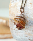 Side view of raw citrine necklace antique bronze showing wire wrapping detail and natural unpolished crystal texture
