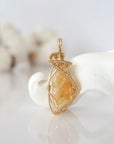 Detailed front view of raw citrine pendant in 14k gold filled. Unique wire wrapped November birthstone jewelry by Designs by Nature Gems.