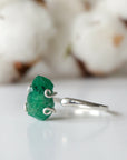 Left side view of raw emerald ring in sterling silver with adjustable band and handcrafted artisan details