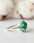 Right side detail of natural raw emerald ring in sterling silver with adjustable artisan ring design