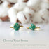 Two raw emerald adjustable rings in gold vermeil showing natural variation in emerald size, shape, and green colour