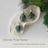 Three different raw emerald pendants displayed for variation reference