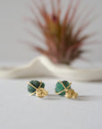 Back view of raw emerald stud earrings in 14k gold vermeil showing artisan setting and earring post detail