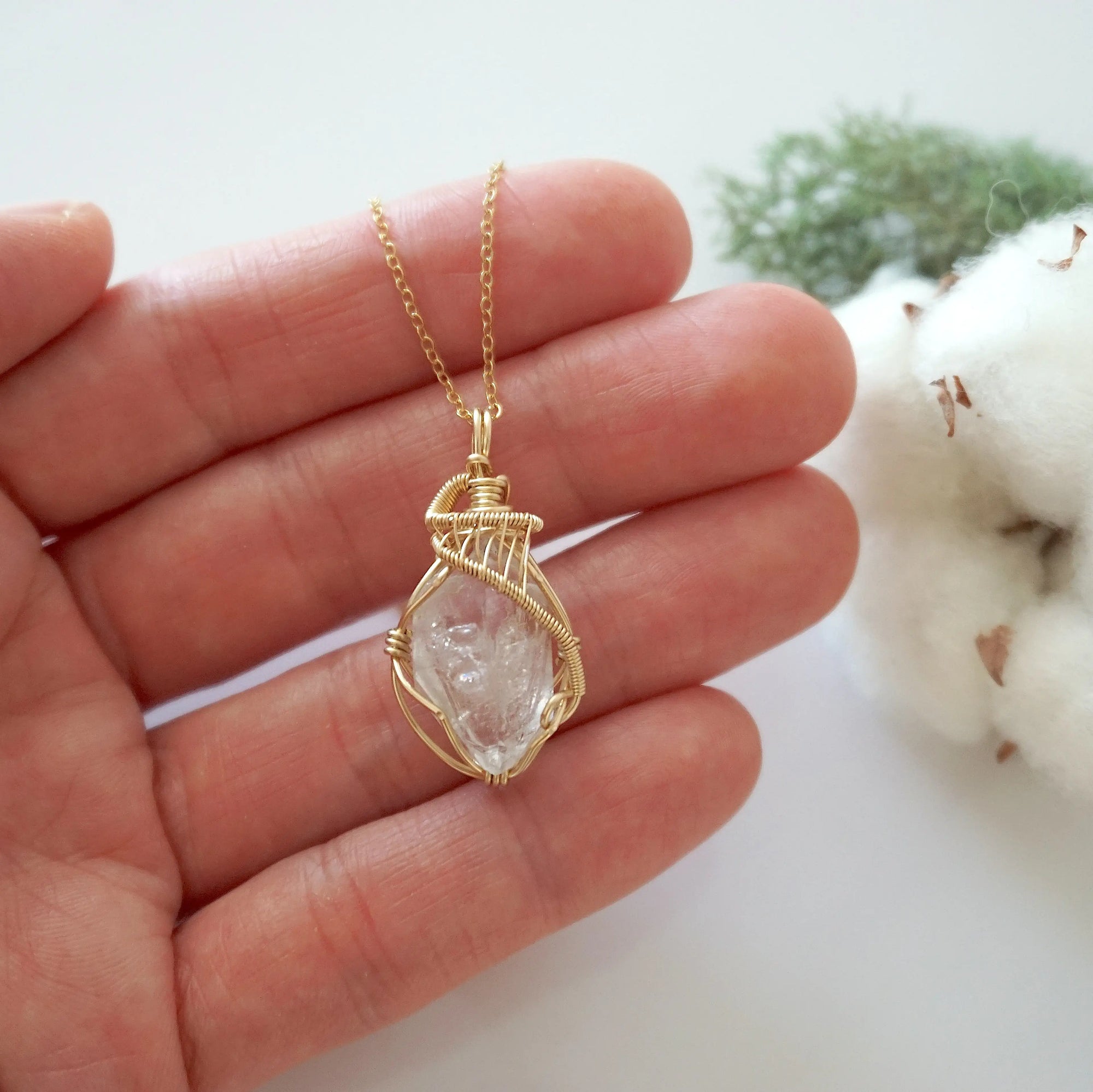 Raw Herkimer diamond necklace in 14k gold filled shown in hand for size reference. Artisan April birthstone pendant by Designs by Nature Gems.