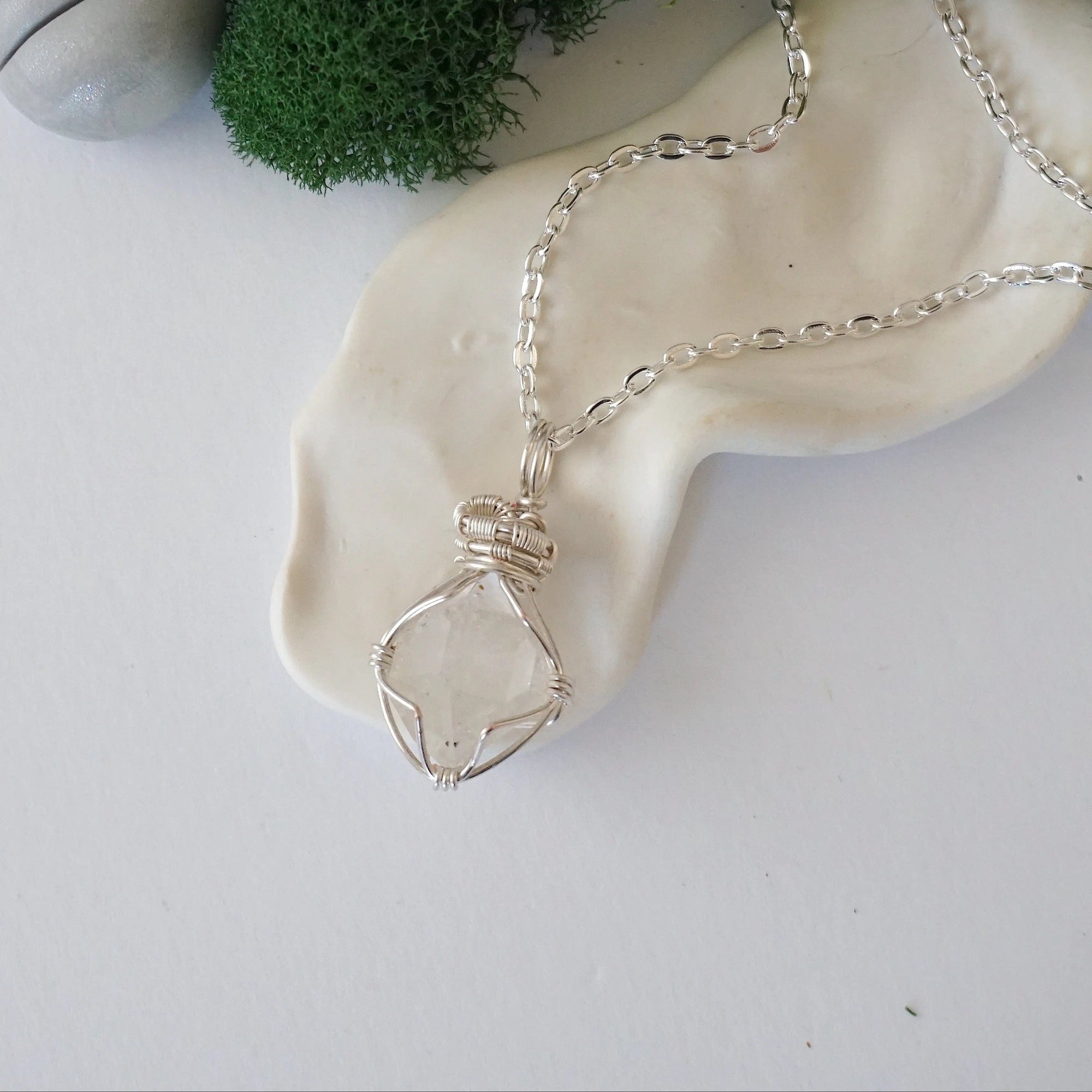 Detailed view of raw Herkimer diamond necklace with artisan wire wrapping in soft silver copper for women.
