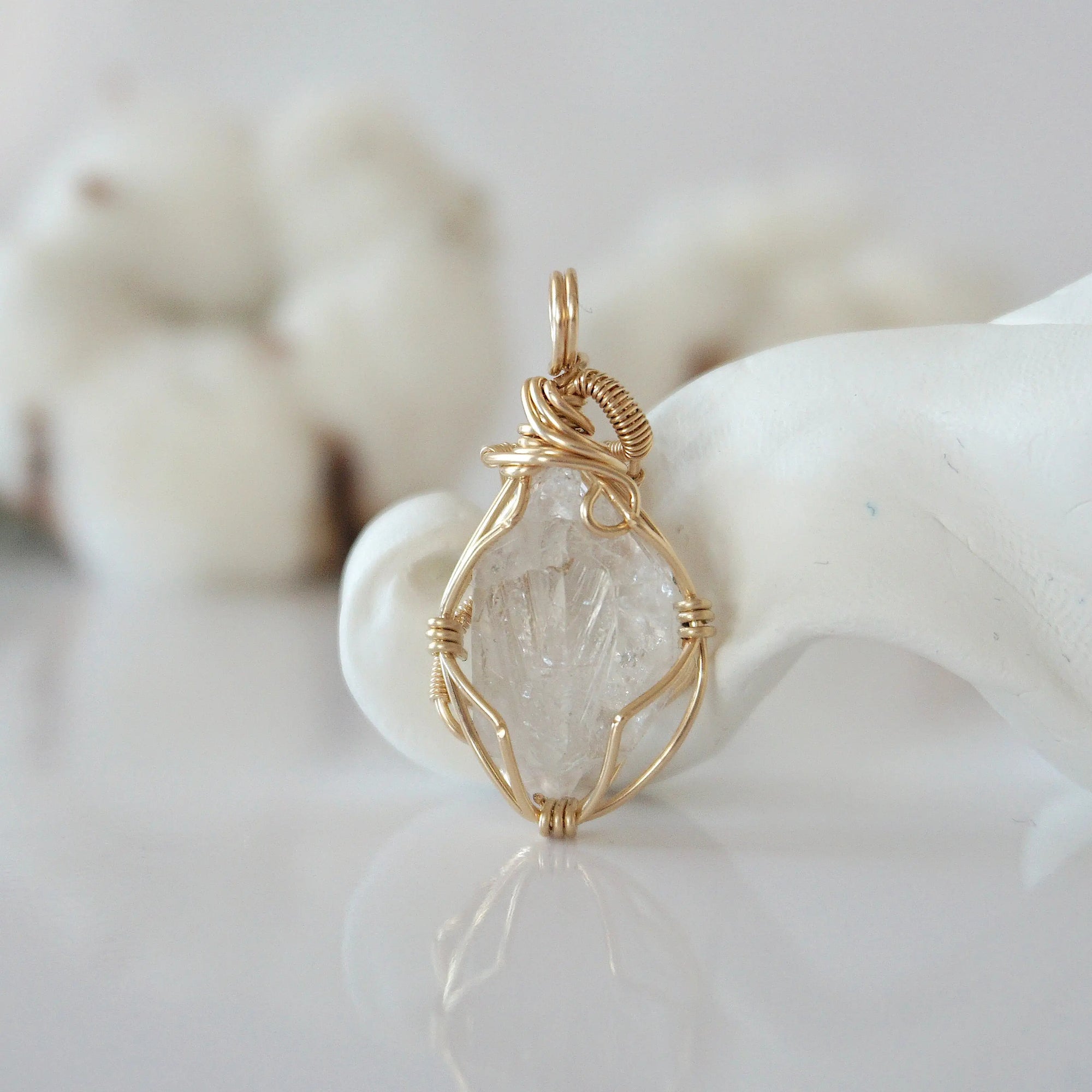 Back view of raw Herkimer diamond pendant in 14k gold filled, highlighting stone and wire detail. One of a kind April birthstone jewelry by Designs by Nature Gems.