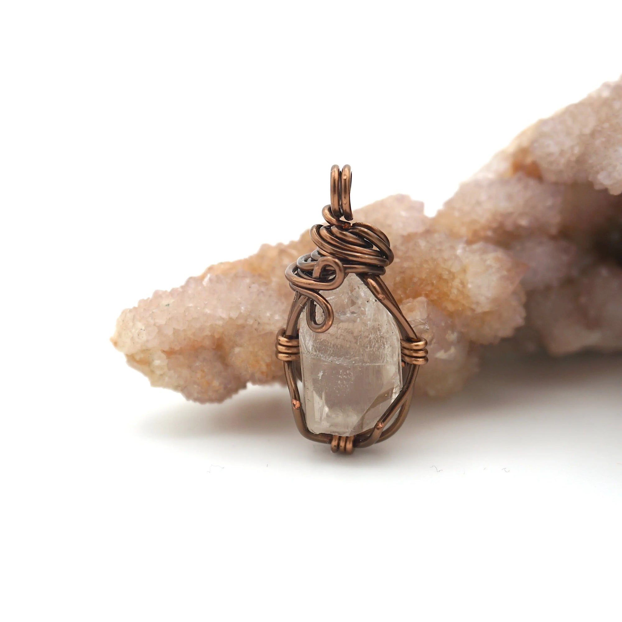 Back angle view of handmade Herkimer diamond pendant highlighting detailed wire wrapping in antique bronze copper.