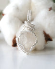 Back view of raw Herkimer diamond pendant for women with handcrafted 925 sterling silver wire wrapping.