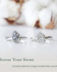 Two adjustable raw Herkimer diamond rings in 925 sterling silver showing natural variation in stone size and shape.