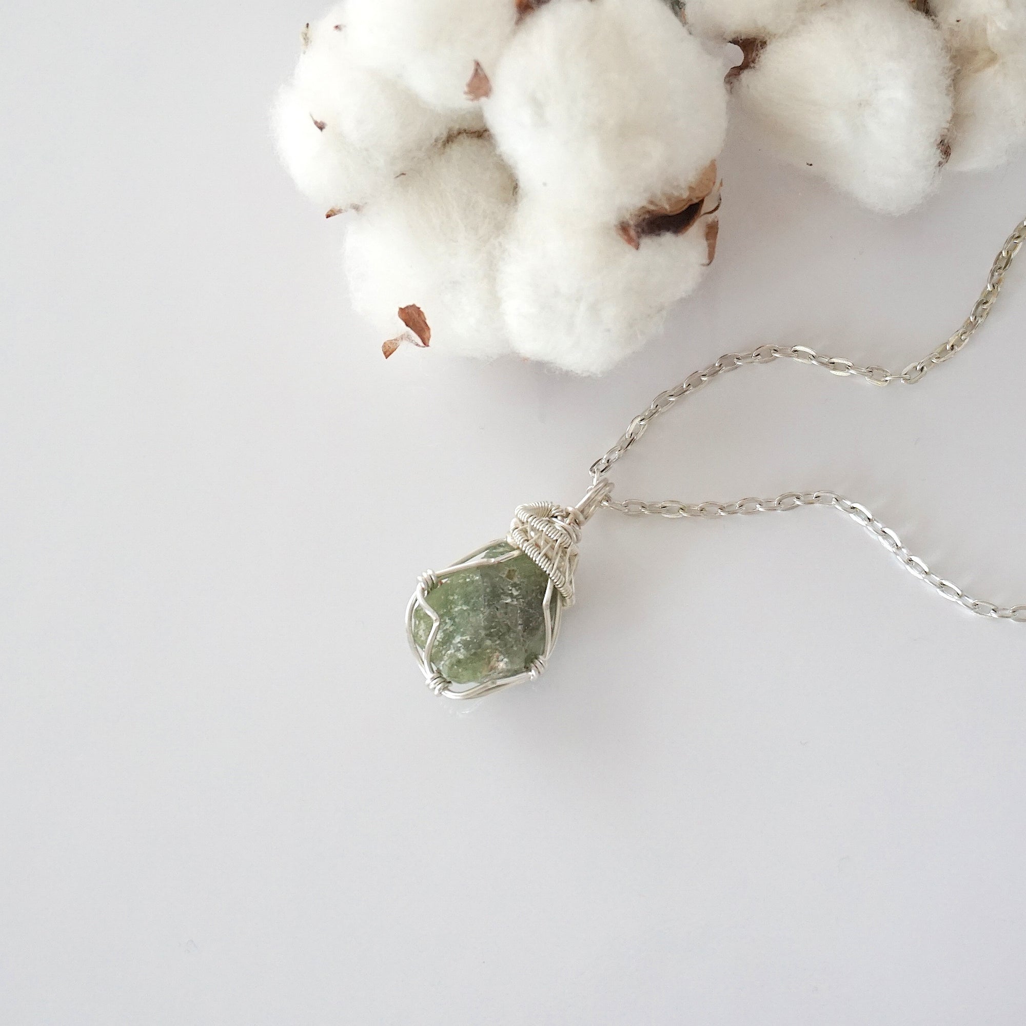 Raw peridot necklace for women — handmade silver wire wrapped pendant on silver cable chain, August birthstone, by Designs by Nature Gems