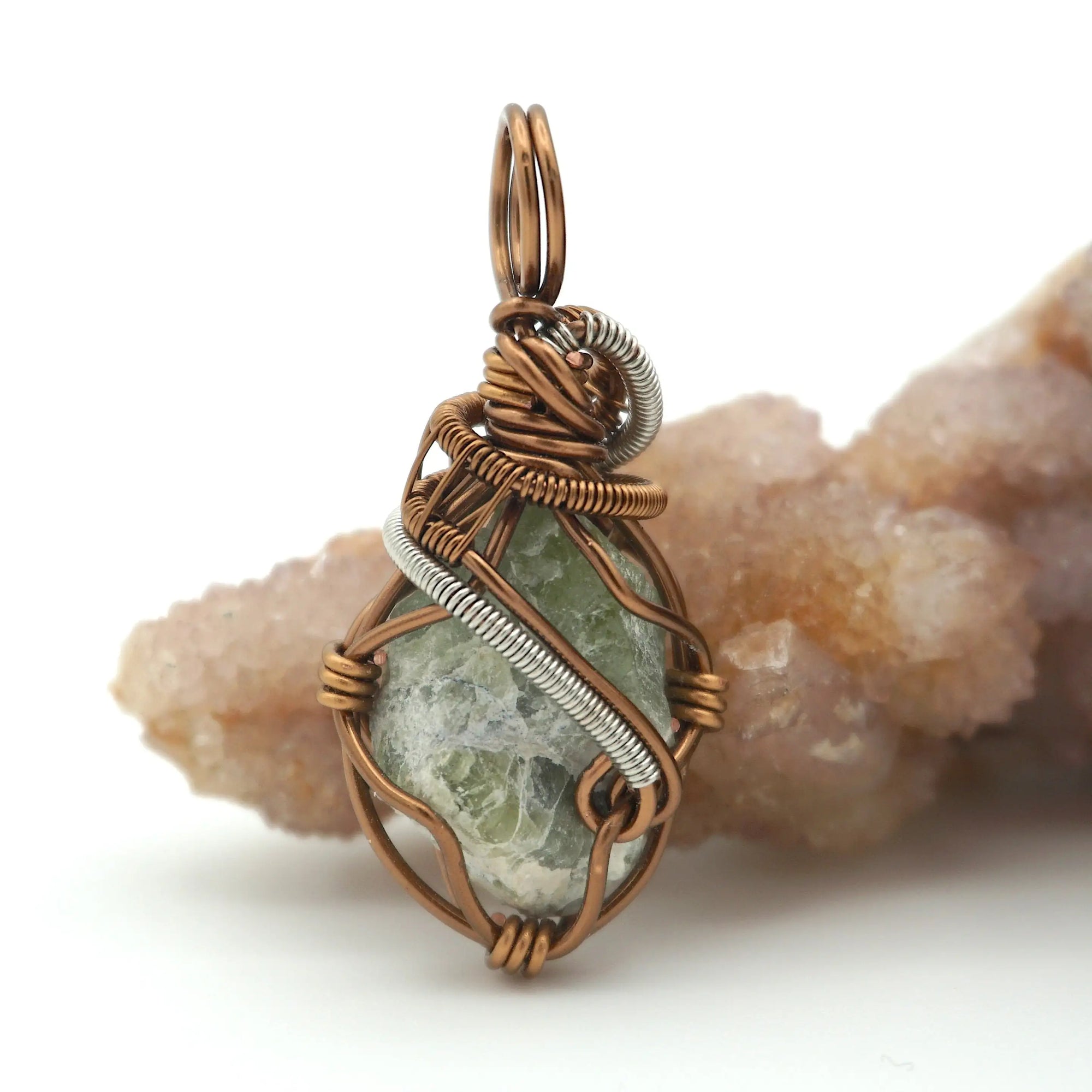 Back view of raw peridot wire wrapped pendant for men — antique bronze and dark silver copper wire weave detail, handcrafted artisan crystal necklace