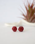 Front view of raw ruby stud earrings showing natural rough stone surface — minimalist 925 sterling silver crystal stud earrings for women