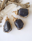 Three raw sapphire pendants showing natural variation in size, shape, and depth of colour — each women's 14k gold-filled wire-wrapped necklace is individually handcrafted and one of a kind