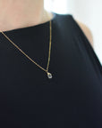 Woman wearing small delicate citrine necklace 14k gold filled minimalist crystal pendant jewelry
