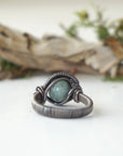 Back view of antiqued sterling silver emerald ring band showing handcrafted structure and ring design