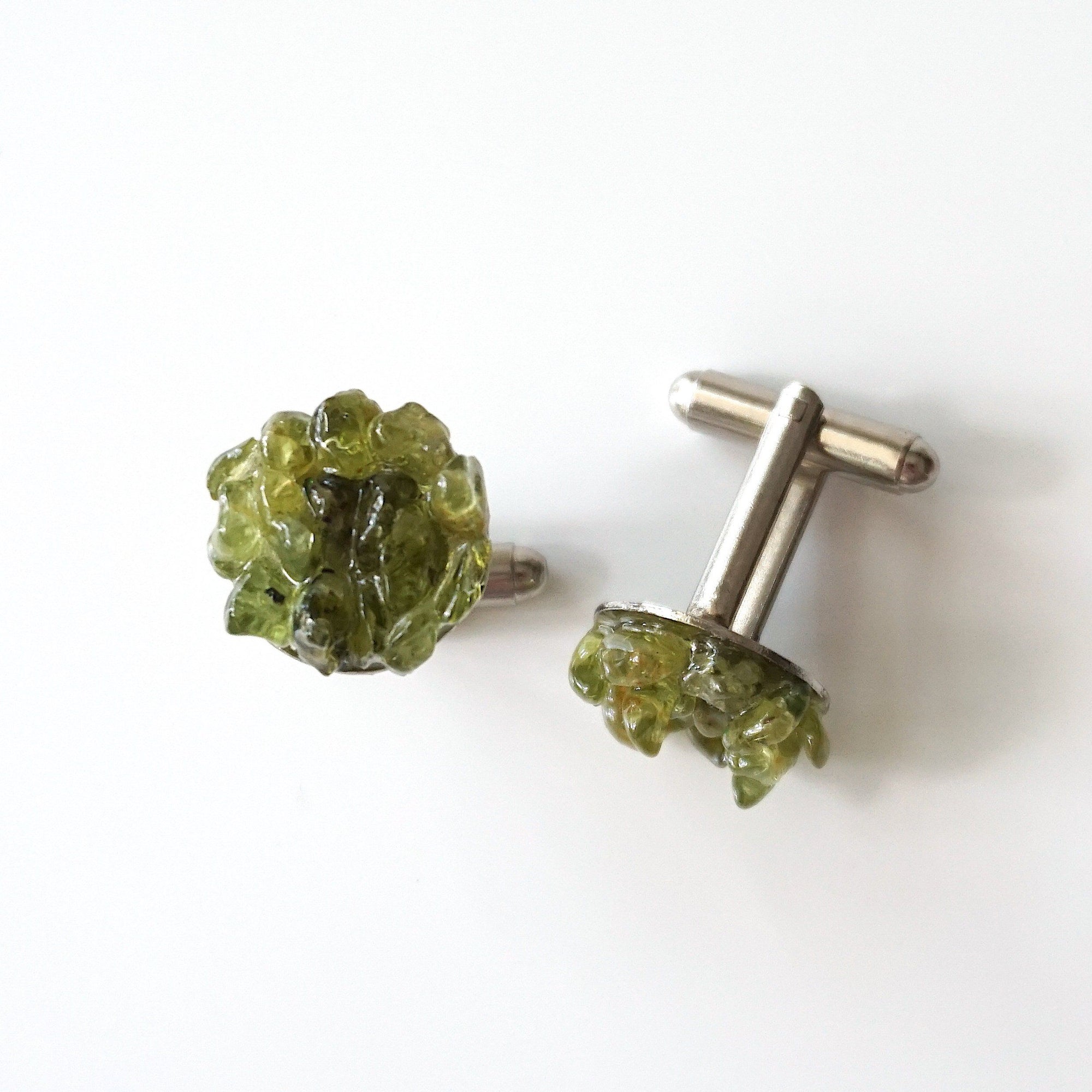Top view of peridot cufflinks for men — genuine raw peridot stone cluster in white gold finish setting, natural olive green crystal, August birthstone handmade jewelry